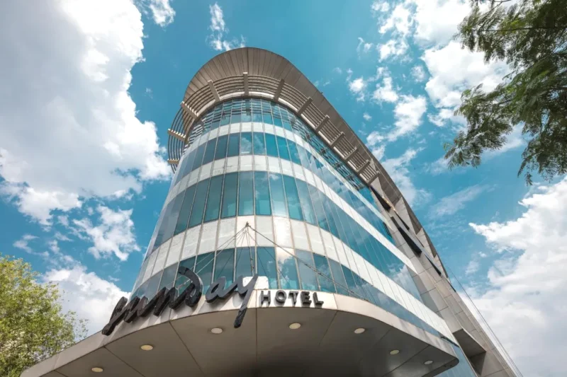 Tall glass building Sunday Hotel Jaipur Premium 5-Star Hotel in C Scheme