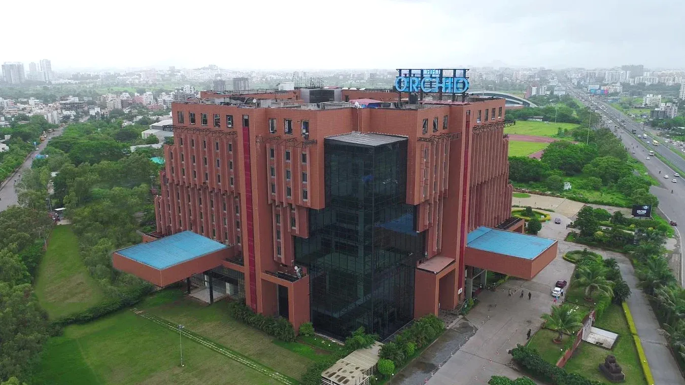 Tall red building Luxury Hotel The Orchid Hotel Hinjewadi Pune